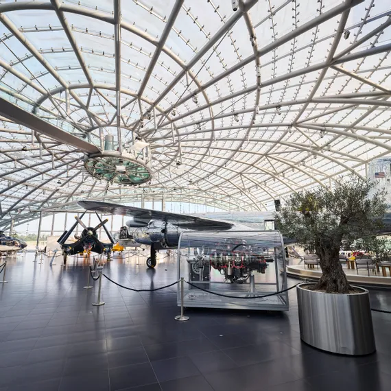 Interior view of Hangar-7 showing its glass-and-steel architecture and exhibits in the exhibition