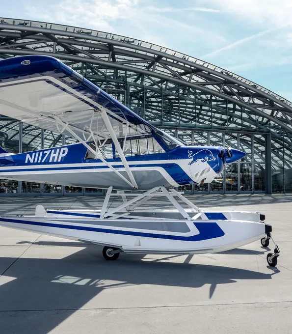 Aviat Husky aircraft in front of Red Bull Hangar-7