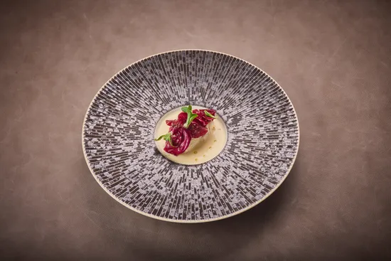 Plate with dish, Pikeperch – Cicorino – Spiced nuts – Lamb’s lettuce