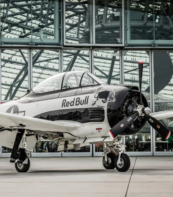 North American T-28b aircraft in front of Red Bull Hangar-7 