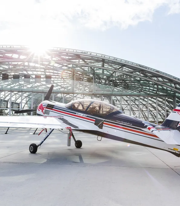 Sukhoi Su-29 aircraft in front of Red Bull Hangar-7 