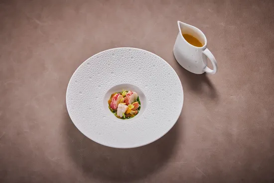 Plate with dish, Pinneberg wannabe lobster soup (by Tim Raue)
