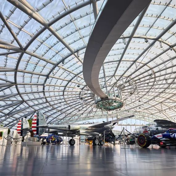 Interior view of Hangar-7 showing its glass-and-steel architecture and exhibits in the exhibition