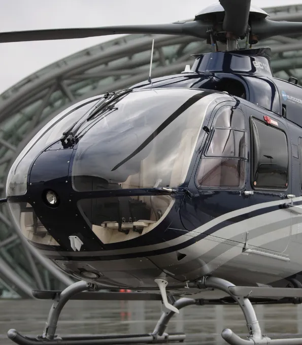 Eurocopter EC 135 Helicopter in front of Red Bull Hangar-7 