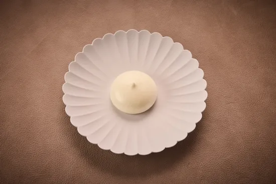 Plate with dish, Sea bass – Cucumber meringue – Tzatziki sorbet