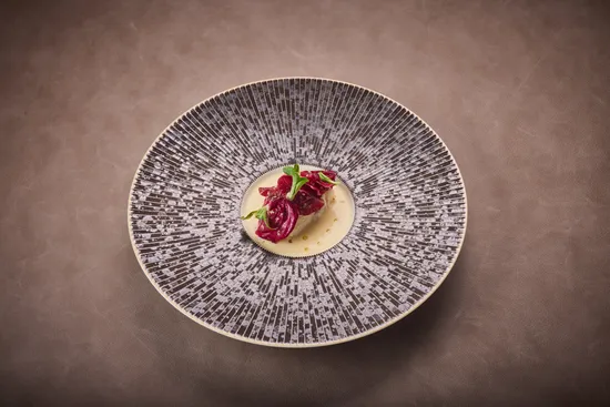 Plate with dish, Pikeperch – Cicorino – Spiced nuts – Lamb’s lettuce